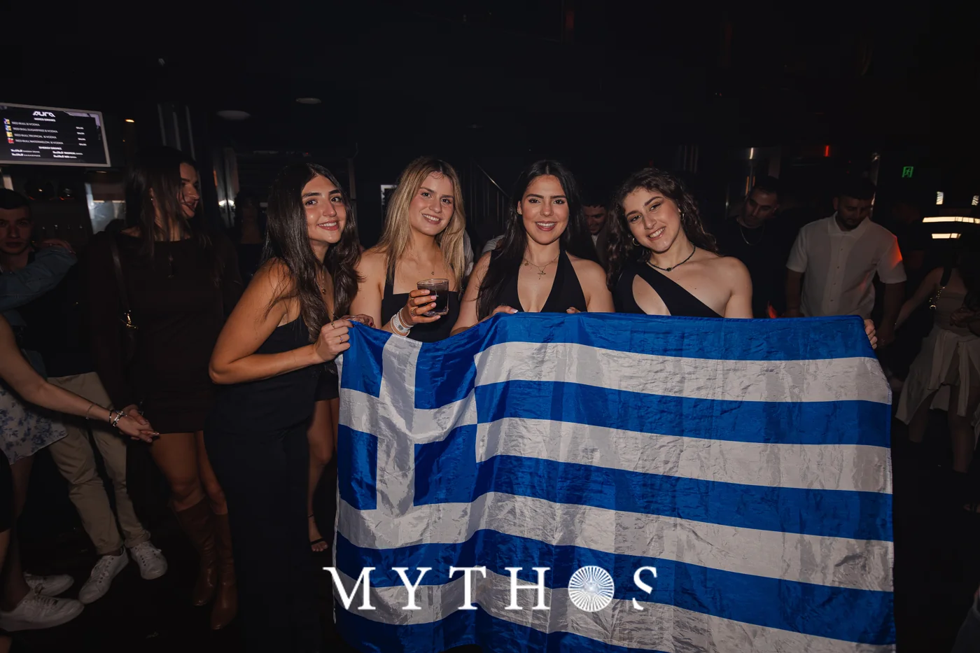 Guests with the Greek flag at MYTHOS, AURA, 22 August 2025