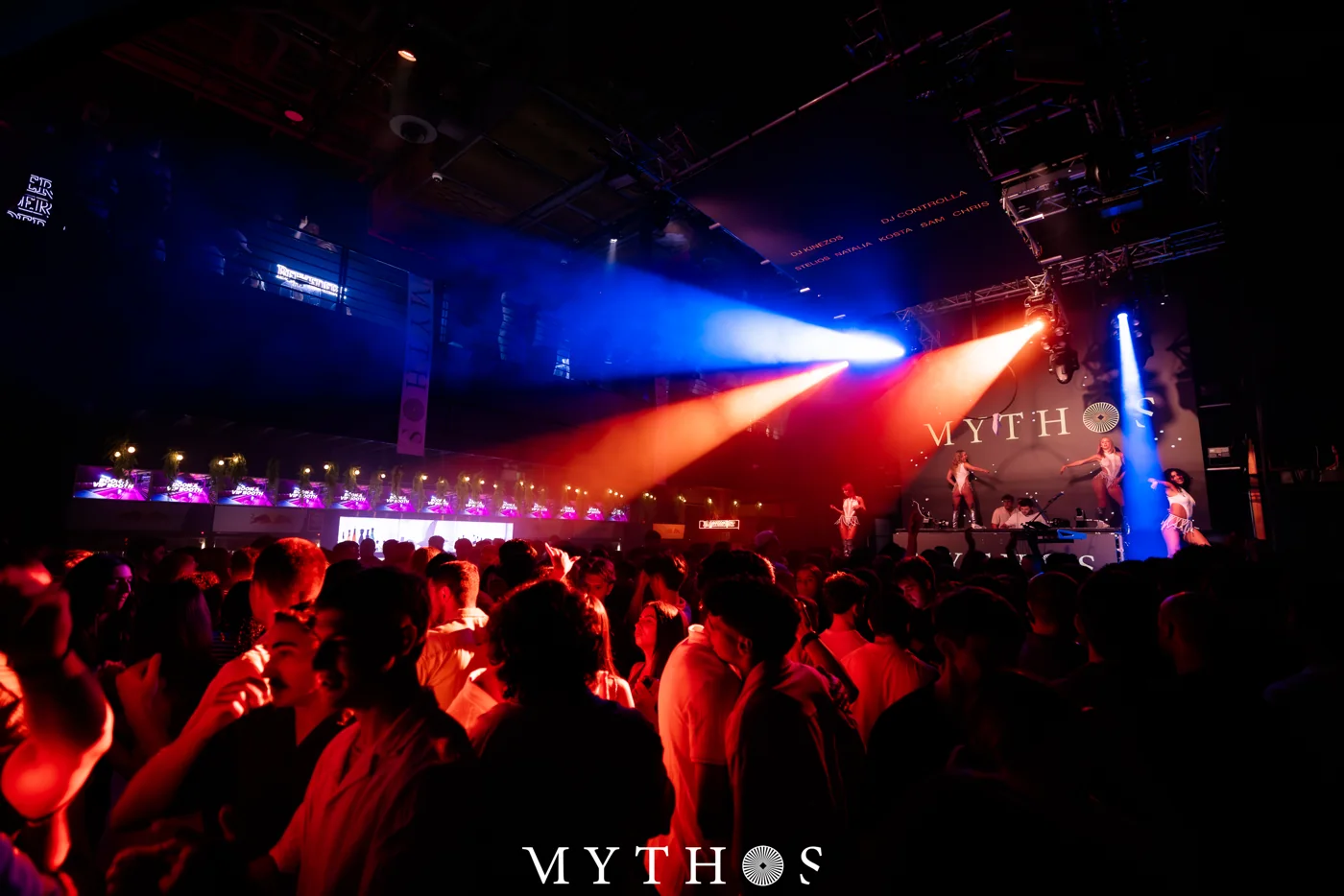 Crowd under coloured lights at MYTHOS, HOME THE VENUE, 19 December 2025