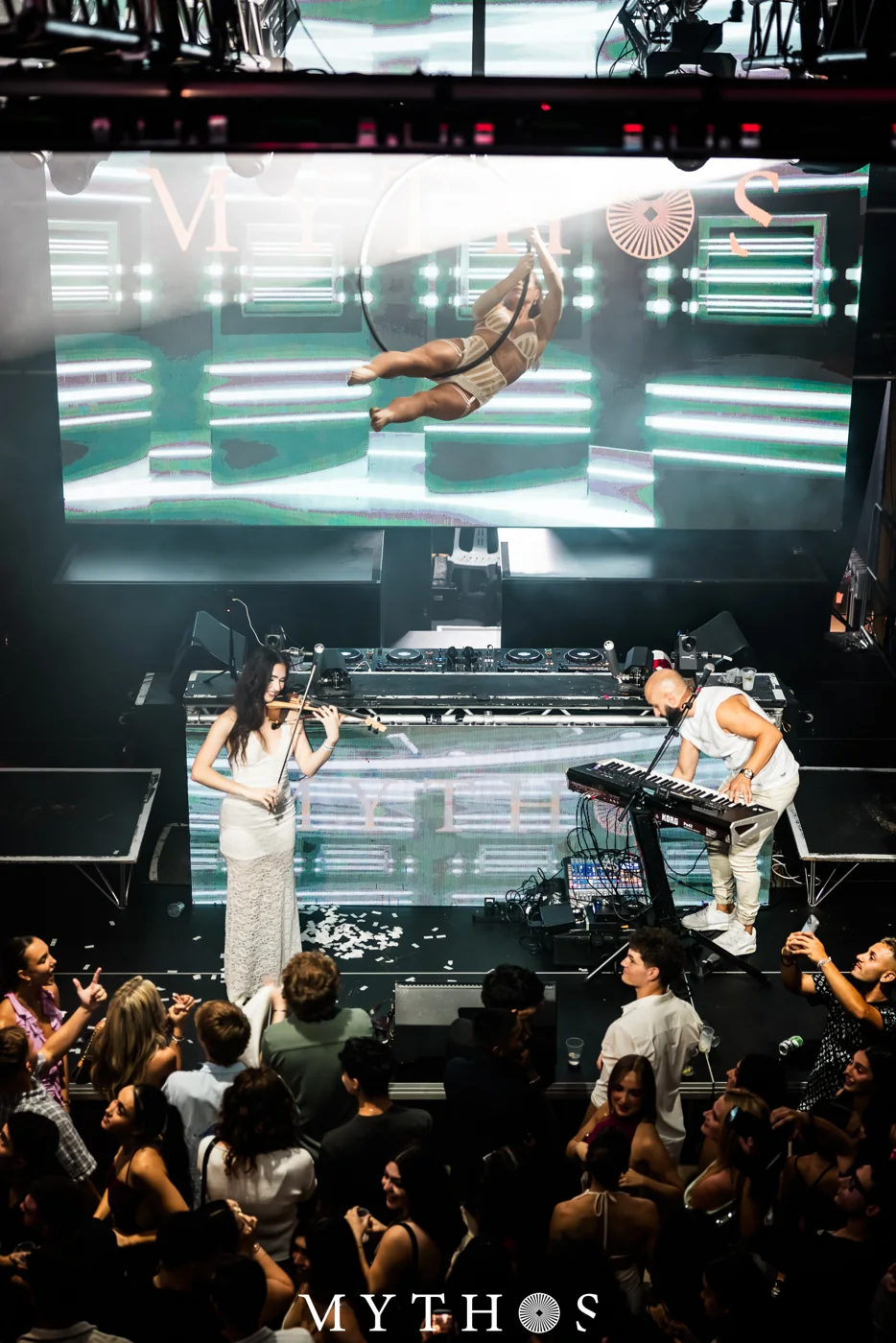 Live band on stage at MYTHOS, HOME THE VENUE, 19 December 2025