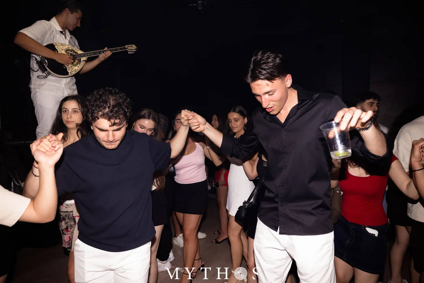 Guests dancing with a live musician at MYTHOS, HOME THE VENUE, 19 December 2025