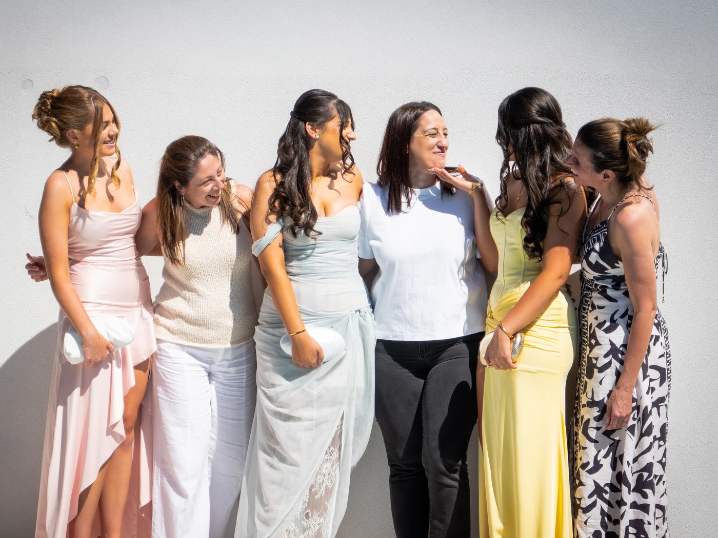 Guests sharing a joyful moment together before a celebration